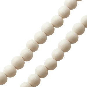 Perles rondes en bois blanc sur fil 6mm (1)