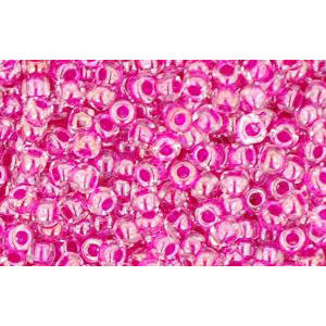 cc350 - perles de rocaille Toho 11/0 crystal/fuchsia lined (10g)