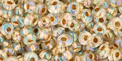 cc994 - perles Toho magatama 3mm gold lined rainbow crystal (10g)