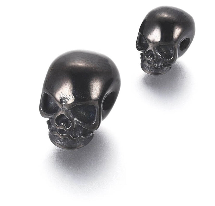 Perle tête de mort 11mm trou 2.5mm horizontale Acier NOIR gunmetal(1)