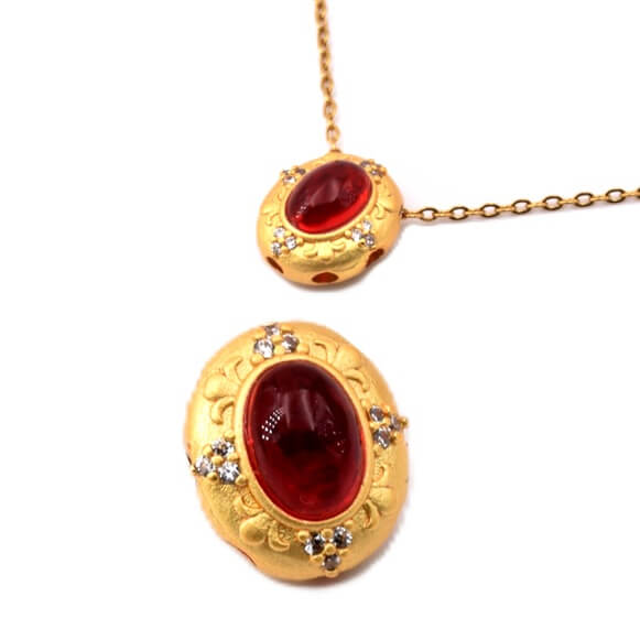 Perle ovale multirang en laiton doré mat et cabochon rouge 12x10mm (1)