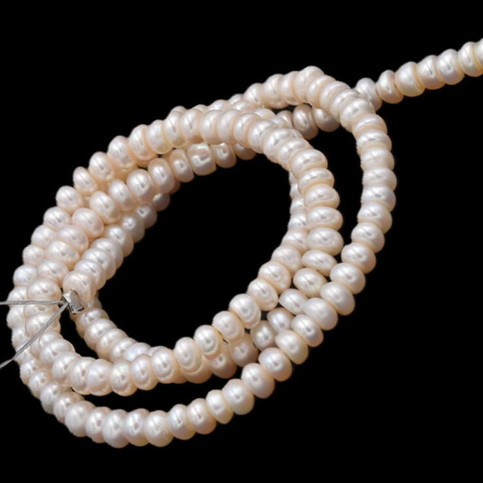 Perles d'eau douce bouton rondelle white cream - 4x2mm - Trou: 0.5mm (1 fil)