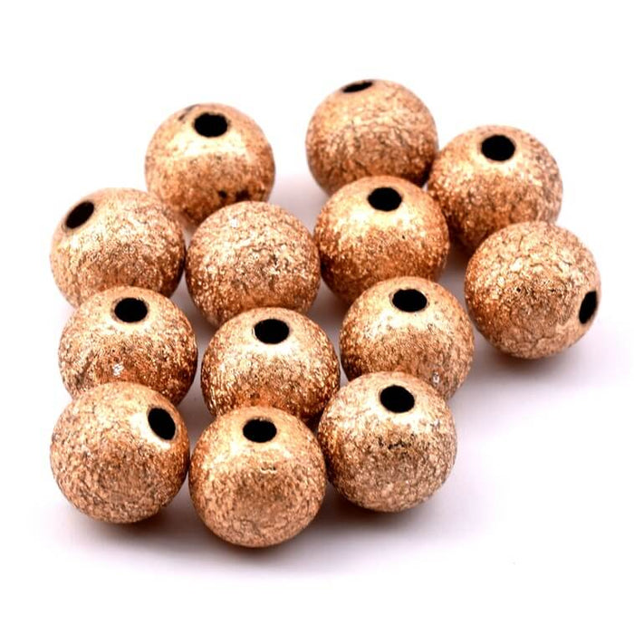 Perle ronde en résine doré mat stardust 10mm - Trou : 2mm (30)
