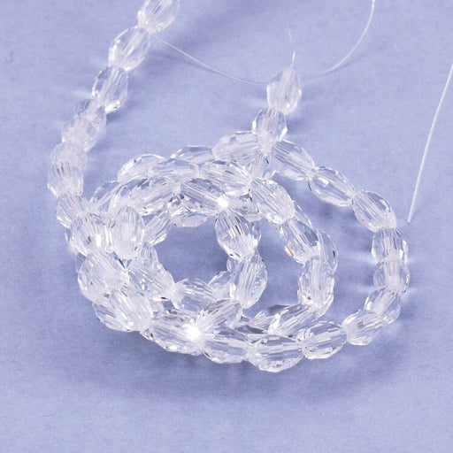 Perle ovale à facettes en verre cristal 6x4mm - Trou: 0.8mm (1 Fil-40cm)