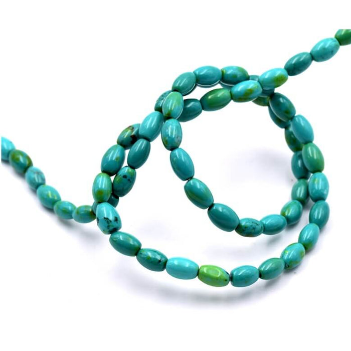 Perle ovale grain de riz magnésite teintée vert turquoise 6x4mm - Trou: 1mm ( 1fil )