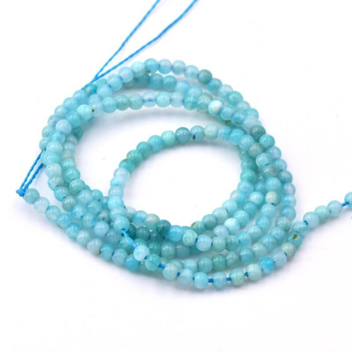Perle ronde amazonite 2mm - Trou: 0.5mm ( 1 fil )