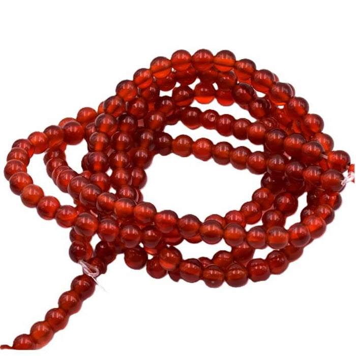 Perle ronde cornaline naturelle 4mm. Trou de 0.8mm (1 fil de 38cm)