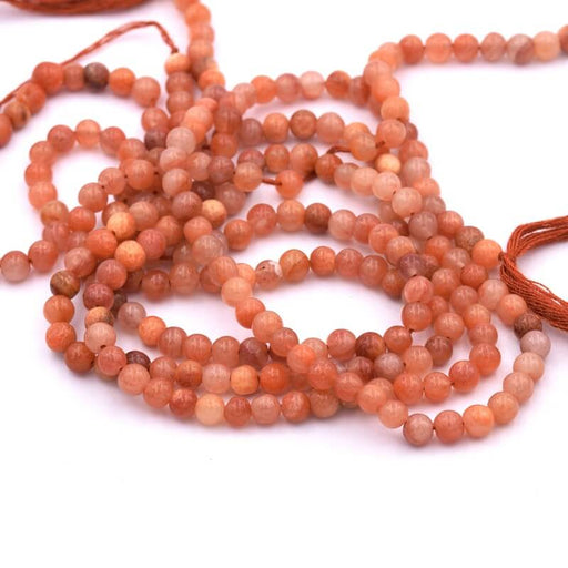 Perle ronde Agate orange 3.5-4.5mm - trou 0.6mm (1 Fil-33cm)