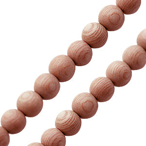 Achat Perle ronde bois rose sur fil 8mm (1)