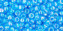 cc163b - perles de rocaille Toho 8/0 transparent rainbow dark aqua (10g)