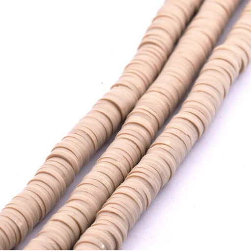 Perle heishi 6x0.5-1mm en pâte polymère beige argile (1 fil- 45cm)