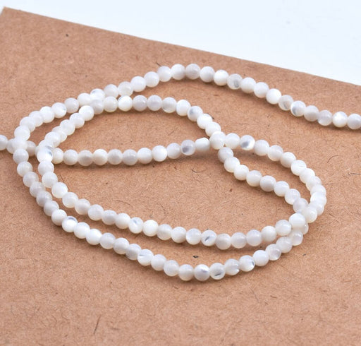 Achat Perles Rondes en Nacre Coquillage Blanc Naturel 2mm - Trou: 0.5mm (1fil - 39cm)