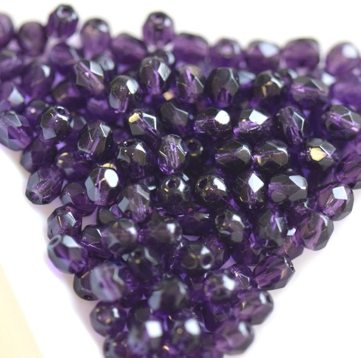 Perles facettes de boheme tanzanite 4mm (100)
