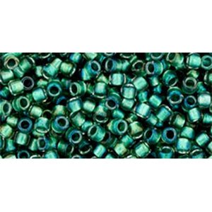 cc264 - perles rondes Toho Takumi LH 11/0 inside colour rainbow crystal/teal lined (10g)